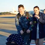 Joshua, petty officer first class, Robi Gordon and their baby Asher head home after Joshuas homecoming from a six-month deployment with VAQ-142. Photo by Laura Guido/Whidbey News-Times