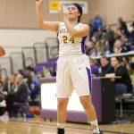 Jordan Wood-Pina tosses a three-point attempt for Oak Harbor.(Photo by John Fisken)