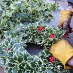 Isaiah Rawls finishes ups a wreath order at A Knot in Thyme located on North Whidbey.