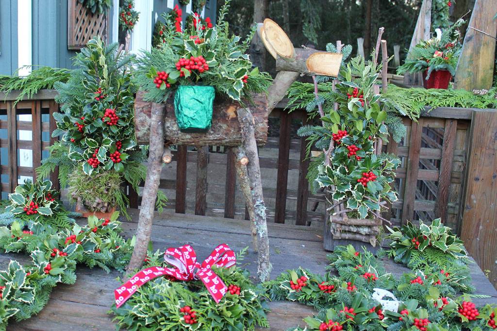 Henderson Holly Farm is also known for its hand-crafted wooden reindeer and outdoor displays created for family photo opportunities.