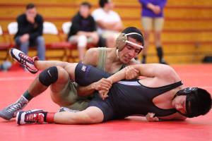 Oak Harbor loses twice / Wrestling