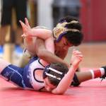 Jamal Graham has Meadowdales Zac Sinnes in trouble.(Photo by John Fisken)