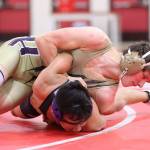 Blake McBride works for a pin against Kamiaks SeHwan Kim.(Photo by John Fisken)