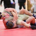 Dylan Sanchez pins Meadowdales Devin Deweese in the first round.(Photo by John Fisken)