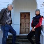 Bill and Jan Skubi pose in front of old San de Fuca school house looking out on Penn Cove. The married Coupeville couple are both poets and active in the new group, Oak Harbor Poetry Project. Bill Skubi will be reading his poems Sunday, including one about the former school house.                                Photo by Patricia Guthrie/Whidbey News-Times