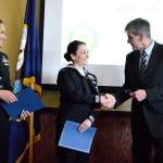 County Commissioner Rick Hannold recognizes the Oak Harbor Navy League and Rotary Club Sailors of the Year at a luncheon Friday. Left: Jennifer Deburkarte, logistics specialist first class, and Sheri Russell, religious programs specialist first class, were named the reserve and shore Sailors of the Year respectively. Sea Sailor of the Year Dustin Walker, aviation ordnanceman first class could not attend the luncheon because he was on detachment in Florida. Phoot by Laura Guido/Whidbey News-Times