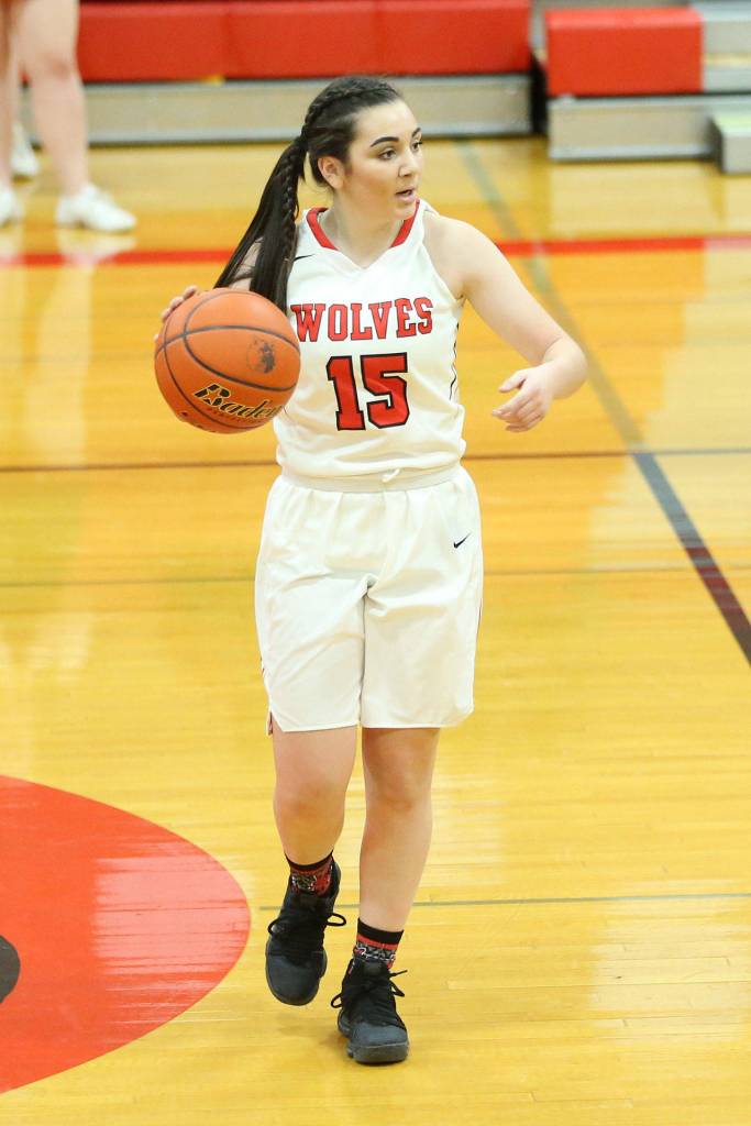 Point guard Kalia Littlejohn gets the offense started Friday.(Photo by John Fisken)