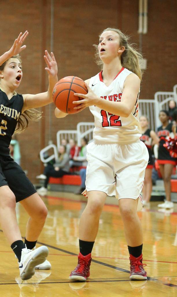 Allison Wenzel prepares to shoot for Coupeville in Fridays game with Sequim.(Photo by John Fisken)