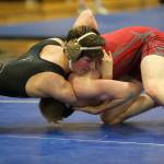 Blake McBride fights for a take down in the championship match Saturday.(Photo by John Fisken)