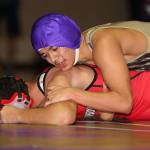 Oak Harbors Giovanni Ribay, top, takes control in his match with Humoody Smith, who is blind. (Photo by John Fisken)