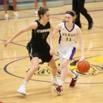 Olivia Waite (11) tries to get by the defense of Lynnwoods Rachel Walsh.(Photo by John Fisken)