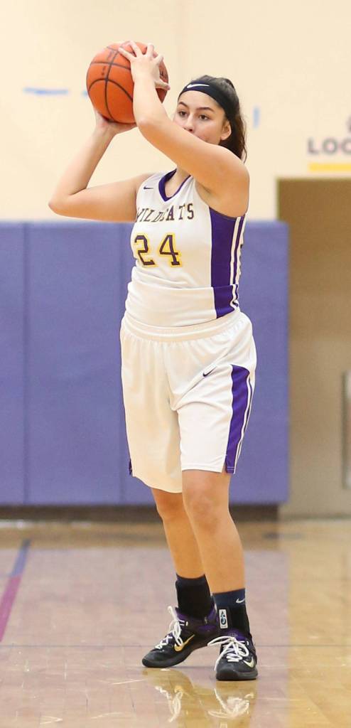 Jordan Wood-Pina looks for an open teammate in Wednesdays game with Lynnwood.(Photo by John Fisken)