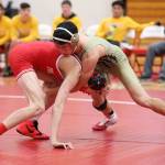 Jakob Dailey, right, tries to take down Marysville-Pilchucks Tanner Lauzon. (Photo by John Fisken)