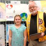 Photo provided                                Coupeville Lions President Dave Fish, right, with Peace Poster Contest winner Tara Halterman.