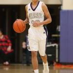 Point guard Gavin Allen brings up the ball to get the offense going. (Photo by John Fisken)