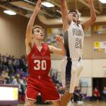 Weston Whitefoot powers through Snohomishs Carter Sparks for two points. (Photo by John Fisken)