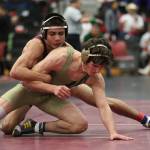 Oak Harbors Blake McBride, front, works to free himself from ODeas Nate Balinbin. McBride went on to pin Balinbin to claim third place.(Photo by John Fisken)