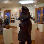 Photographer Ed Evans looks over the collaborative exhibit, Pasticcio, on Wednesday evening. The exhibit, held at Bayviews Front Room Gallery, showcases five artists who learned of each others work through their love of pool. Photos by Kyle Jensen/Whidbey News Group