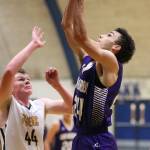 Haven Brown shoots over Burlington-Edisons Mitchell Wessen.(Photo by John Fisken)