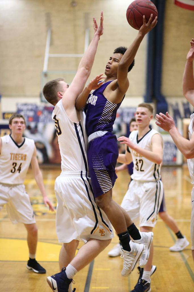 Oak Harbors Terrell Crumpton soars toward the hoop Monday night.(Photo by John Fisken)
