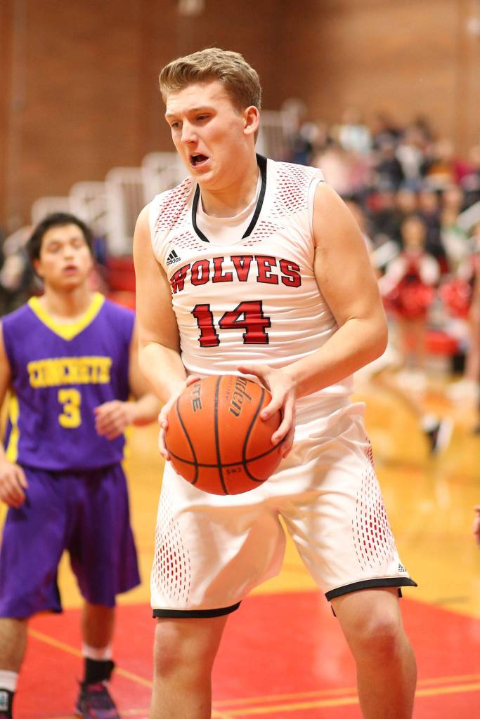 Dane Lucero comes down with a rebound against Concrete.(Photo by John Fisken)