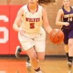 Coupevilles Kyla Briscoe takes off on a fast break in the win over Concrete. (Photo by John Fisken)