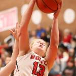 Hannah Davidson hauls in a rebound for Coupeville.(Photo by John Fisken)