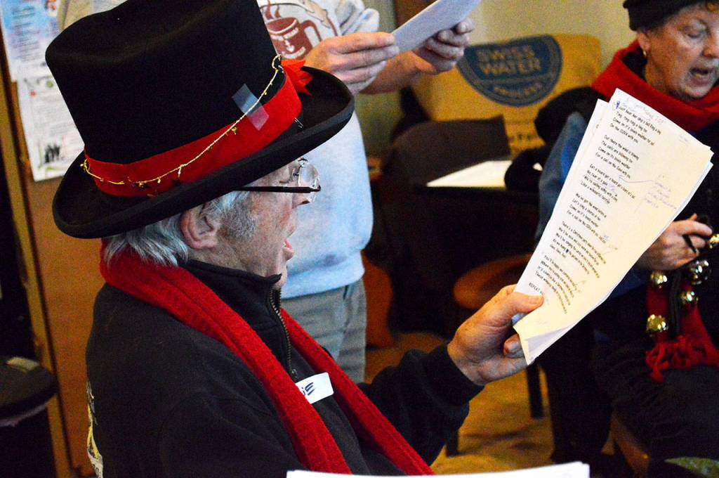 Photo by Laura Guido/Whidbey News-Times                                Wylie Vracin rehearses for the Coupeville Caroling Contest, happening from 1-2 p.m. today. He is a member of the Suva-Neers, representing the Coupeville Maritime Heritage Foundation.
