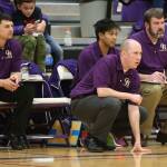The Oak Harbor coaching staff, Eric Collins (left), Matt Nuqui, John Weston (kneeling) and John Ney, watch the action Wednesday.(Photo by John Fisken)
