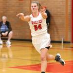 Lindsey Roberts passes ahead during a Coupeville fast break.(Photo by John Fisken)