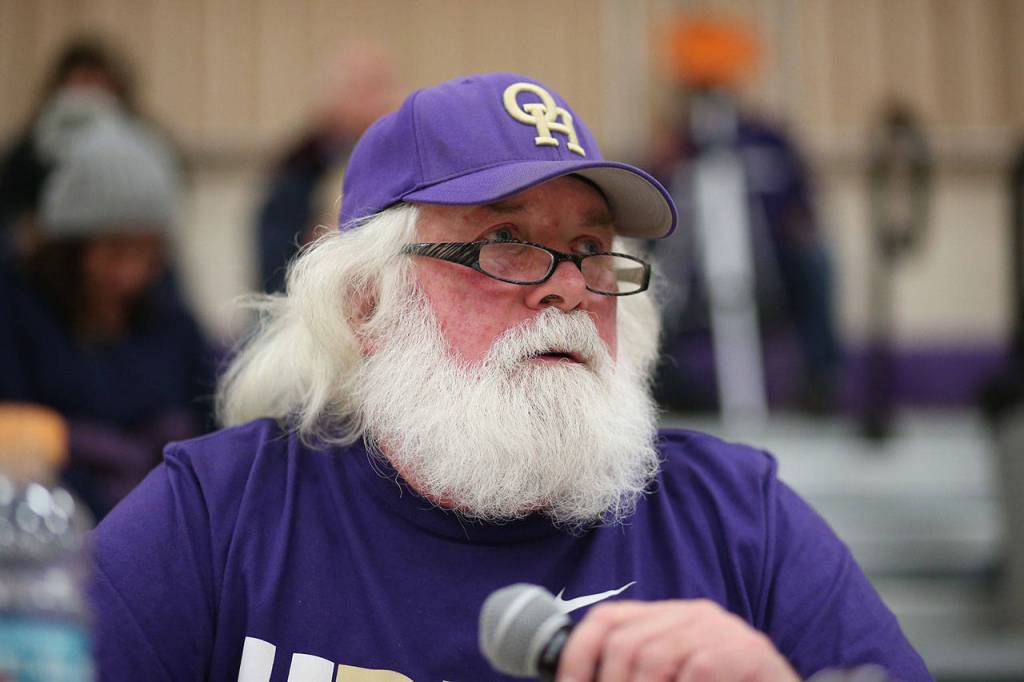 Public address announcer Jay Long follows the action.(Photo by John Fisken)