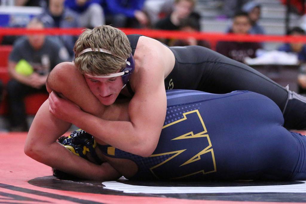 Michael Fisken pins Mariners Jose Parra in the championship match of the Panther Classic Saturday.(Photo by John Fisken)