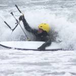 Evan Thompson / The Record  Freeland resident Scott Robbins battles waves as he attempts to kitesurf during a windy morning on Dec. 28 at Useless Bay.