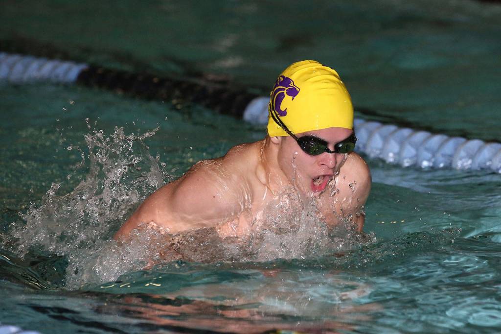 Kyto Morrow swims the breaststroke for Oak Harbor in Mondays meet.(Photo by John Fisken)