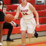 Ema Smith hustles the ball up the court for the Wolves.(Photo by John Fisken)