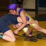 Grace Chargualaf, right, works for a takedown during Wednesdays match. (Photo by John Fisken)