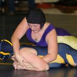 Cheyanne Winchester, right, sets up a hold in one of her matches Wednesday.(Photo by John Fisken)