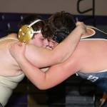 Arlington holds off Oak Harbor’s upset bid / Wrestling