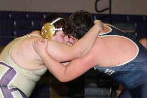 Arlington holds off Oak Harbor’s upset bid / Wrestling