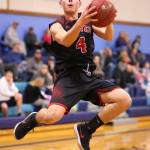 Hunter Smith flies to the hoop for a bucket Saturday.(Photo by John Fisken)