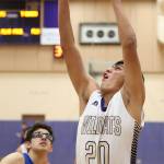 Oalk Harbors Weston Whitefoot puts up a shot after collecting an offensive rebound against Shorewood earlier this month.(Photo by John Fisken)