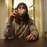 Evan Thompson / The Record  Langley resident Steven Sutton smokes a joint on his day off from work Monday night. Sutton, who is a bud tender at Whidbey Island Cannabis Company in Freeland, isnt worried about the federal governments promise to heavily enforce marijuana laws.