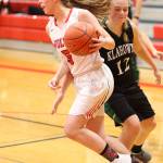 Coupevilles Kyla Briscoe beats Klahowyas Karli Eberhard off the dribble. (Photo by John Fisken)