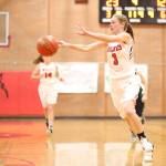 Chelsea Prescott passes the ball during a Coupeville fast break Tuesday. (Photo by John Fisken)