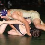 Oak Harbors Caleb Fitzgerald, top, turns Tanner Condon on the way to a second period fall.(Photo by John Fisken)