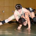 Blake McBride battles with the Chargers Trey Padgett during his 5-2 decision Thursday.(Photo by John Fisken)