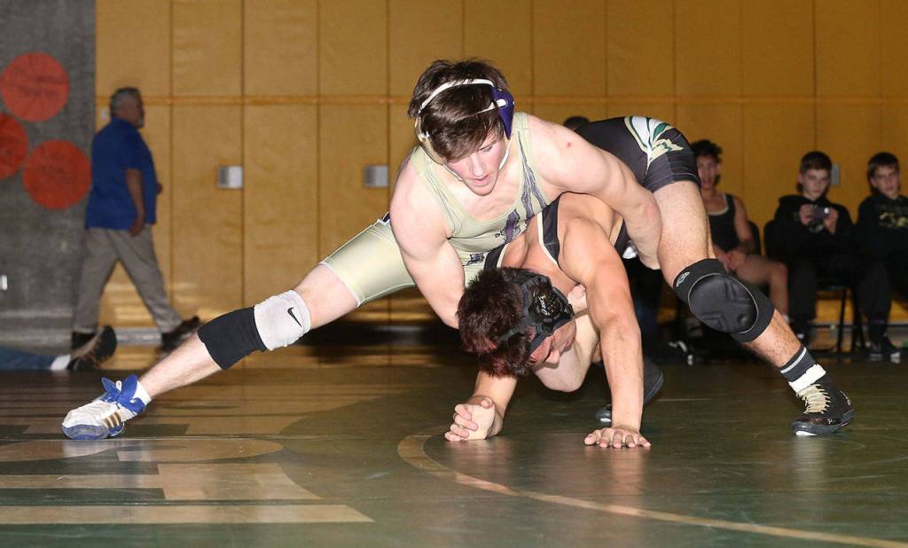 Blake McBride battles with the Chargers Trey Padgett during his 5-2 decision Thursday.(Photo by John Fisken)