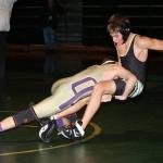Blake Servatius, left, wins by a fall after this takedown at Marysville Getchell.(Photo by John Fisken)