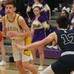 Arlington holds off hard-charging Oak Harbor / Boys basketball