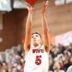 Cameron Toomey-Stout scores for the Wolves Friday.(Photo by John Fisken)